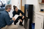 Facilities manager comparing office water service proposals