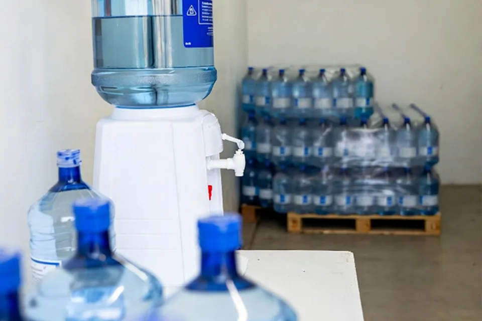 Workplace water station sized for employee bottle-filling demand