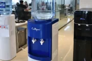 Call center employees using a water station during a break