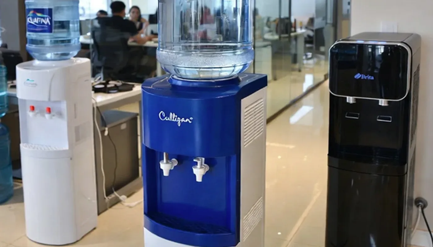 Call center employees using a water station during a break